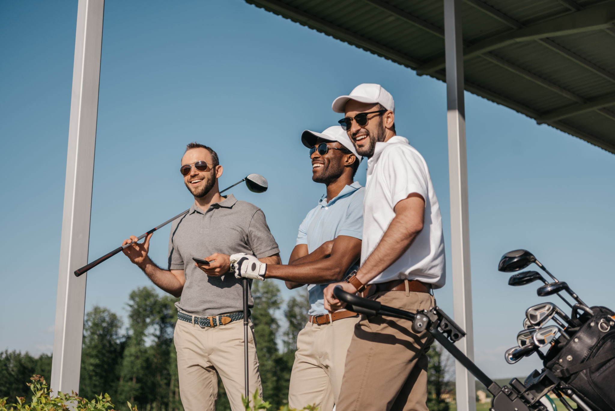 friends playing golf