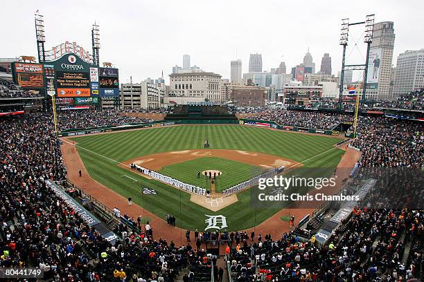 General view of the Detroit Tigers and the Kansas City Royals lined up on the foul lines for the performance of the National Anthem by Miss America...