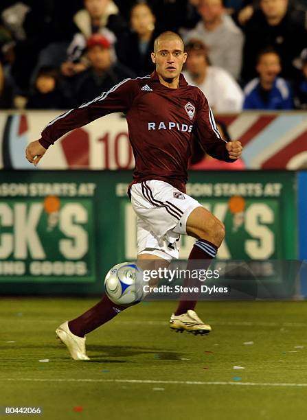 Colin Clark of the Colorado Rapids controls the ball during the MLS soccer game against the Los Angeles Galaxy at Dick's Sporting Good's Park on...