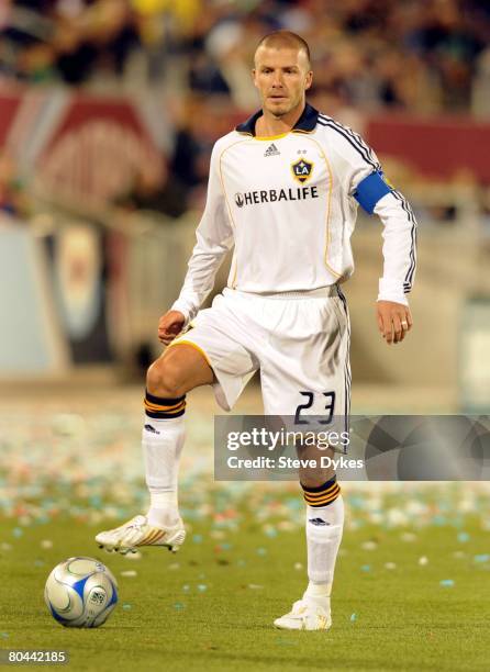 David Beckham of the Los Angeles Galaxy controls the ball during the MLS soccer game against the Colorado Rapids at Dick's Sporting Good's Park on...