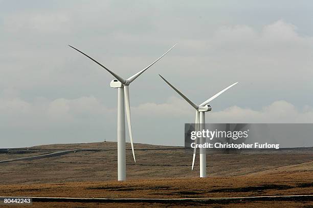 The turbine sails of the controversial Scout Moor Wind Farm in the South Pennines dominate the skyline as the the development takes shape on March...