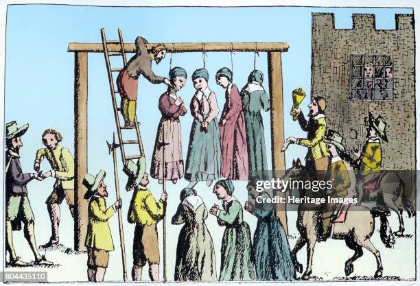An execution of witches in England, 17th century.