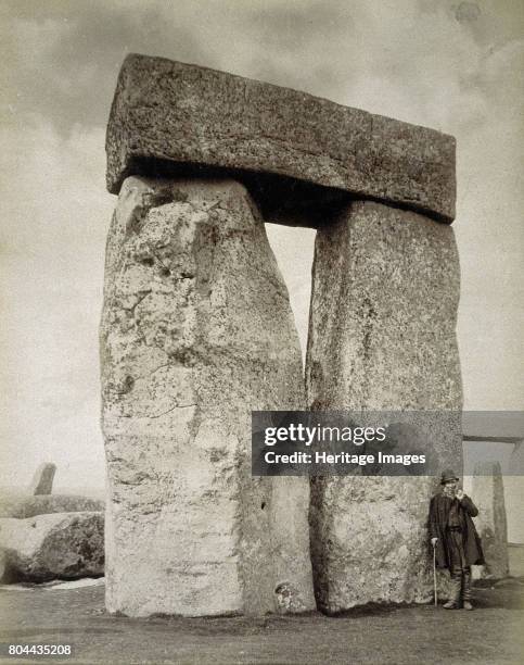 Shepherd posing at Stonehenge on Salisbury Plain, Wiltshire, 19th century.