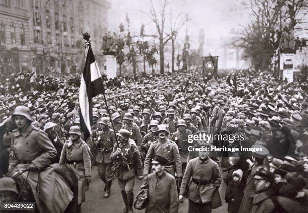 Return of the Guard from the War, Germany, December 1918. Troops of Germany's defeated army returning home after the end of World War I. From...