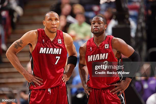 Shawn Marion and Dwyane Wade of the Miami Heat look on during the NBA game against the Sacramento Kings game at ARCO Arena on March 2, 2008 in...