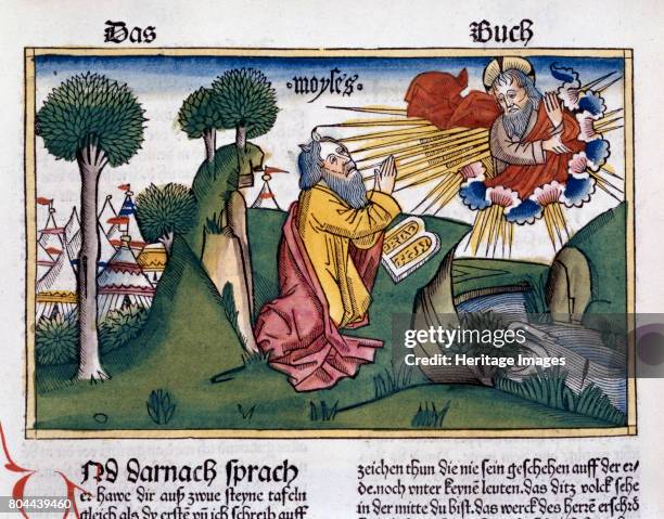 Moses receives the second tablets with the Ten Commandments. Facsimile copy of a 15th century manuscript of the German School. Artist Unknown.