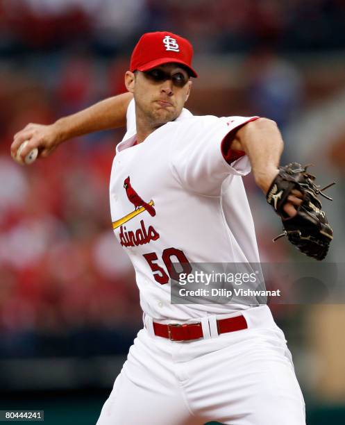 Adam Wainwright of the St. Louis Cardinals delivers a pitch in the first inning against the Colorado Rockies during Opening Day at Busch Stadium...