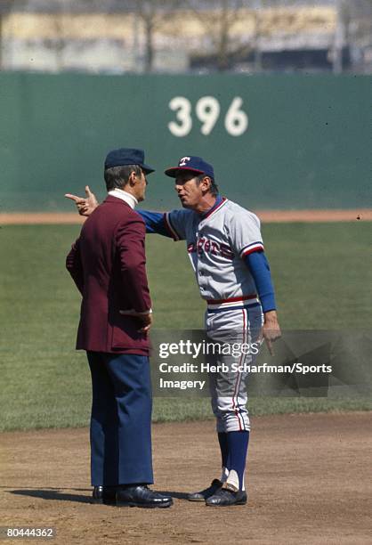 Manager Billy Martin of the Texas Rangers argues with an umpire during a MLB game against the Minnesota Twins in May 1974 in Minneapolis, Minnesota.