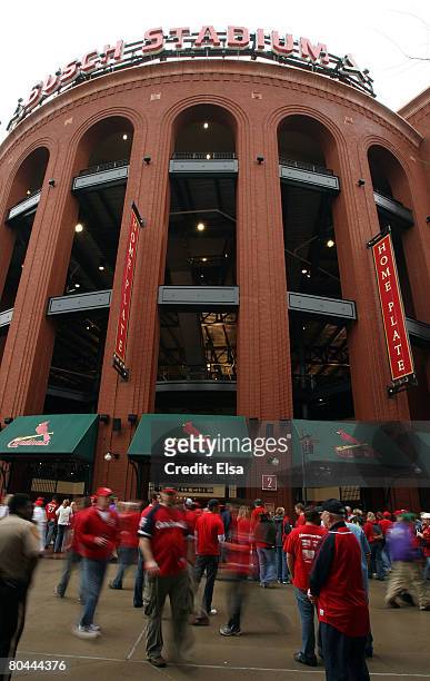 Fans arrive at Busch Stadium before the St. Louis Cardinals take on the Colorado Rockies on opening day March 31, 2008 in St. Louis, Missouri.