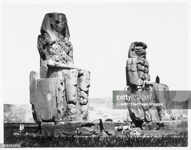 The Colossi of Memnon, Thebes, Egypt, 1860. Two 70ft/21m stone statues of Amenhotep III that stood in front of the mortuary temple that is now...