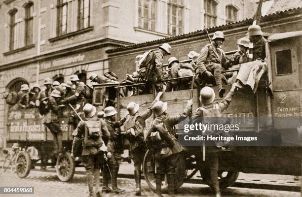 Troops climbing into trucks, Germany, c1926. Founded in c1919, the Sturmabteilung was the paramilitary wing of the Nazi party. Its members were known...