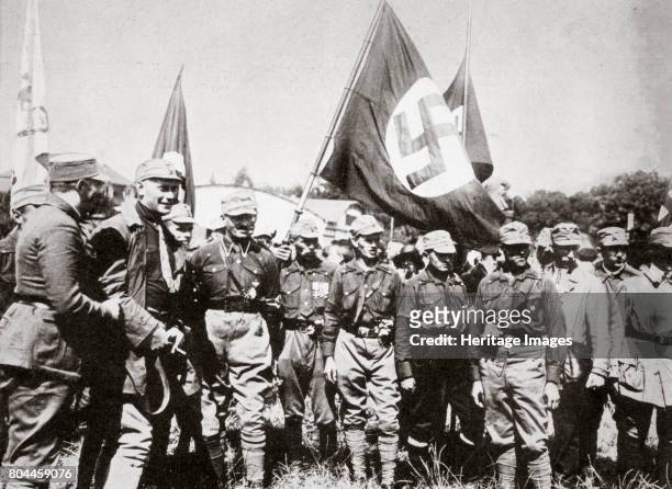 Adolf Hitler and members of the SA at the Weimar rallies, Germany, 3rd-4th July, 1926. To the right behind Hitler is the District Leader of the Ruhr...