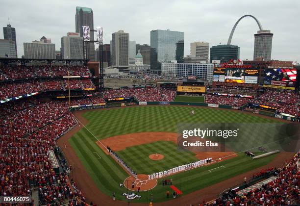 The St. Louis Cardinals and the Colorado Rockies line up for team introductions on opening day at Busch Stadium March 31, 2008 in St. Louis, Missouri.