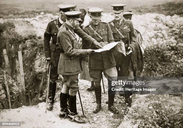 King George V visits the front, France, World War I, 1916. During the Battle of the Somme. King George V discusses the campaign with General Sir...