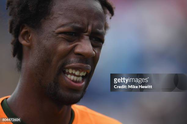 Gael Monfils of France grimaces during his injury filled victory over Richard Gasquet of France during Day 6 of the Aegon International Eastbourne...