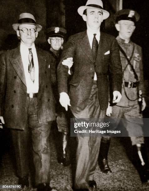Jack 'Legs' Diamond, temporarily in the hands of the law in Troy, New York, USA, July 1931. Diamond was a Prohibition-era Irish-American gangster in...
