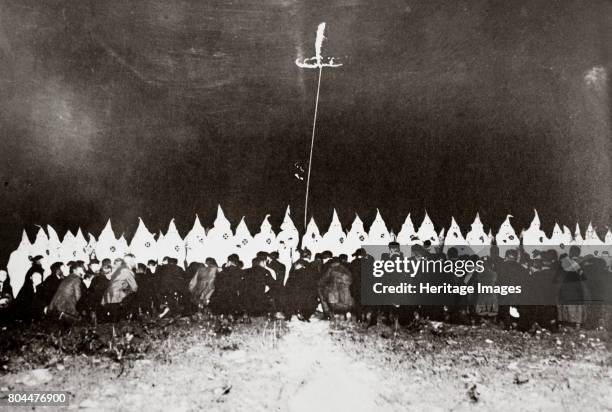 Ku Klux Klan initiation ceremony near Brunswick, Maryland, USA, c1920s. The second incarnation of the Ku Klux Klan was founded in 1915. In the years...
