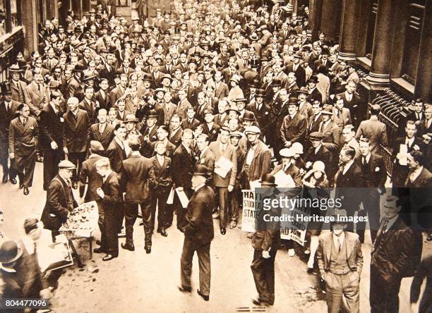 Crowd outside London Stock Exchange after fall of the Hatry Group, 1929. On 20 September 1929 trading in shares in British financier Clarence Charles...