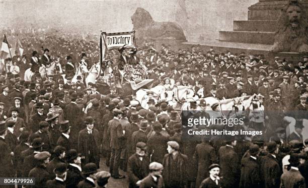 Procession to welcome the early release of suffragettes from prison on 19 December 1908. Procession in Trafalgar Square to welcome Emmeline Pankhurst...
