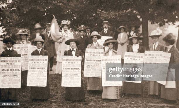 The suffragettes of Ealing, London, 1912. A group of suffragettes holding placards publicising a public meeting to be held on Ealing Common on 1...