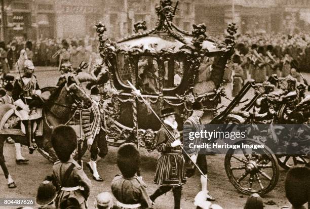 King Edward VII and Queen Alexandra on their way to the State Opening of Parliament, London, 1900s. Edward VII and Alexandra riding in the Royal...