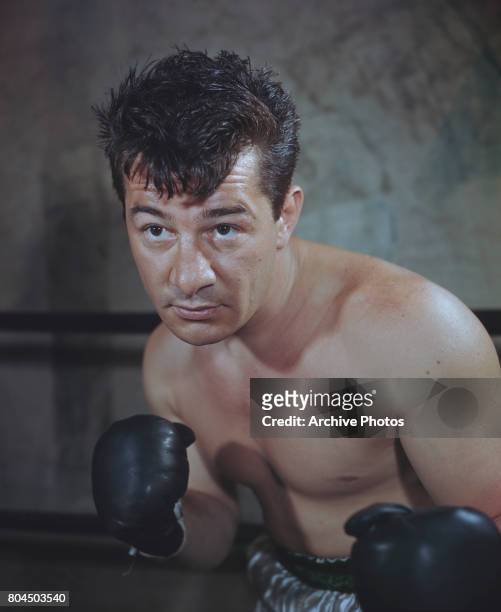 American boxer Rocky Graziano , middleweight world champion from 1947-1948, in a fighting pose, 1940s.