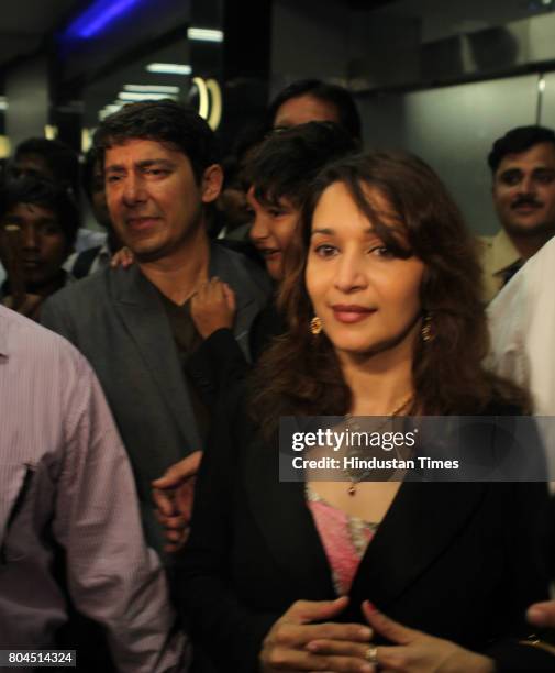 Bollywood actress Madhuri Dixit Nene reach Mumbai airport along with husband Dr. Sriram Madhav Nene and kids on Friday evening.