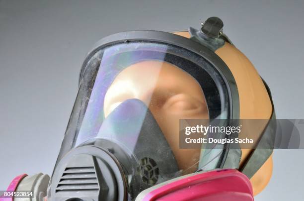 close-up of a workers lung respirator and face shield - respiratory protection construction stock pictures, royalty-free photos & images