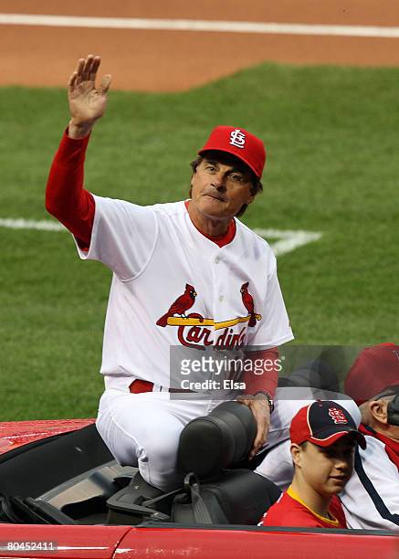 Manager Tony LaRussa of the St. Louis Cardinals waves to fans before opening day game against the Colorado Rockies at Busch Stadium March 31, 2008 in...