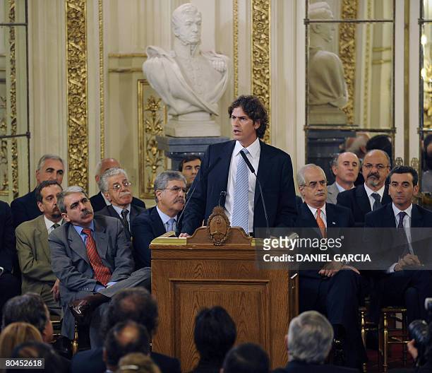 Argentine Economy minister Martin Lousteau speaks about the farmer's strike as other minister listen at the Government house on March 31, 2008 in...