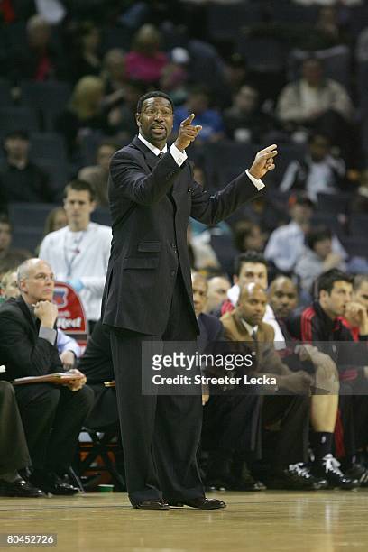 Head coach Sam Mitchell of the Toronto Raptors gestures from the sideline during the game against the Charlotte Bobcats at Bobcats Arena on March 2,...