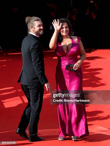 Czech actress Jitka Cvancarova and Petr Cadek arrive at the opening ceremony of the 52st Karlovy Vary International Film Festival on June 30, 2017 in...