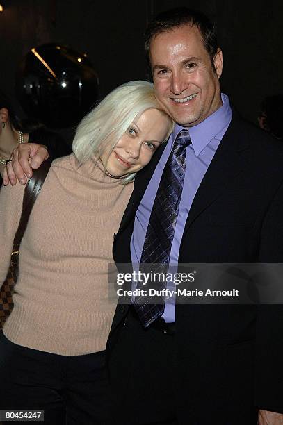 Olympic figure skating champion Oksana Baiul and F.D. Staging Co. President Frank D'Agostino attend a benefit concert of the musical "Mama, I Want to...