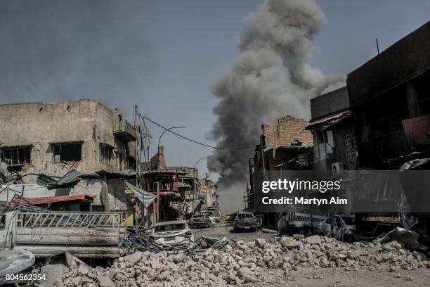 An Iraqi forces airstrike in the Old City of west Mosul near the destroyed al-Nuri mosque where heavy fighting continues on June 30, 2017 in Mosul,...