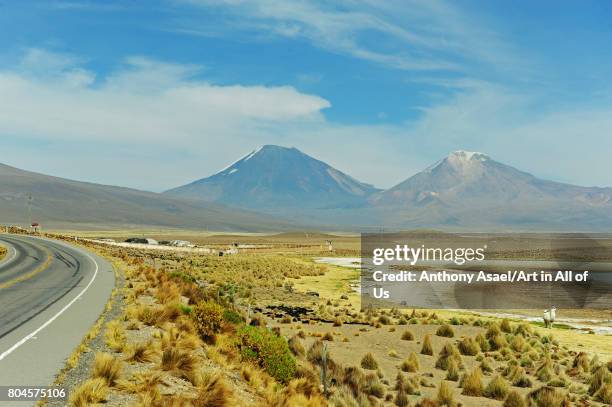 Tarmac road towards volcano Sajama on November, 2016 in Parque Nacional de Sajama, Bolivia.