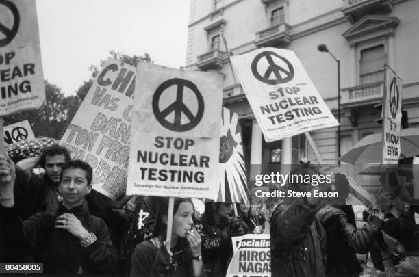 Demonstrators outside the French Embassy in London protesting against French nuclear testing in the Pacific, 5th September 1995.