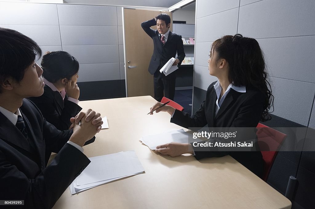 Businessman entering conference room