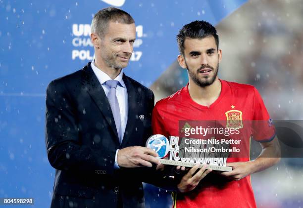Dani Ceballos of Spain is awarded the Player of the Tournament by Aleksander Ceferin, UEFA president during the UEFA European Under-21 Championship...