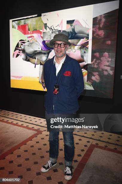 Jaybo Monk poses with his artwork at Bacardi X The Dean Collection Present: No Commission on June 30, 2017 in Berlin, Germany.