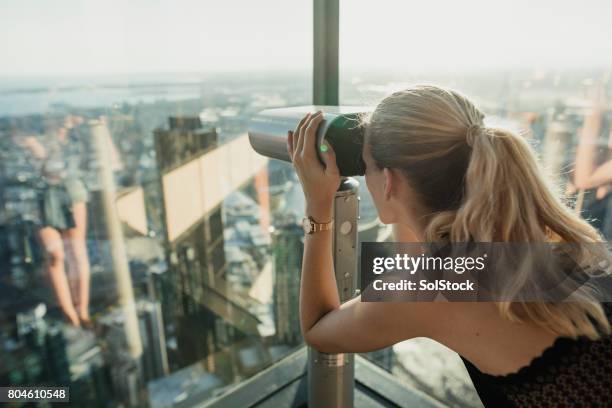 looking through binoculars - eureka tower stock pictures, royalty-free photos & images