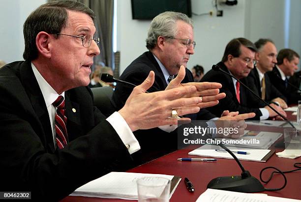 Exxon Mobil Corporation Senior Vice President Stephen Simon responds to questions while testifying before the House Select Energy Independence and...