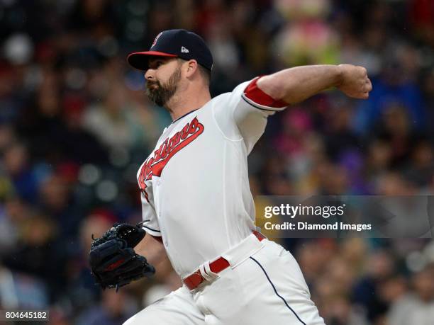 Pitcher Boone Logan of the Cleveland Indians throws a pitch in the top of the sixth inning of a game on June 26, 2017 against the Texas Rangers at...
