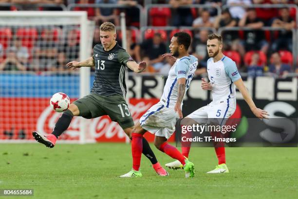 Felix Platte of Germany and Lewis Baker of England battle for the ball during the UEFA European Under-21 Championship Semi Final match between...