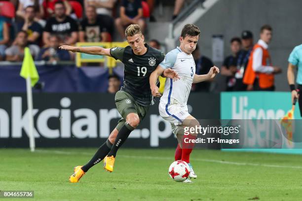 Janik Haberer of Germany and Ben Chilwell of England battle for the ball during the UEFA European Under-21 Championship Semi Final match between...