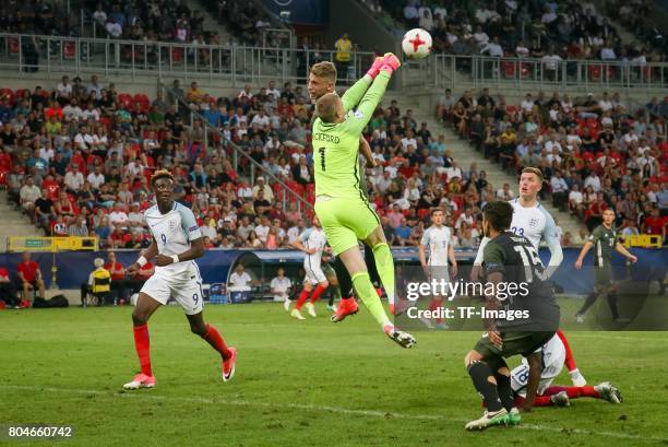 Goalkeeper Jordan Pickford of England and Felix Platte of Germany battle for the ball during the UEFA European Under-21 Championship Semi Final match...