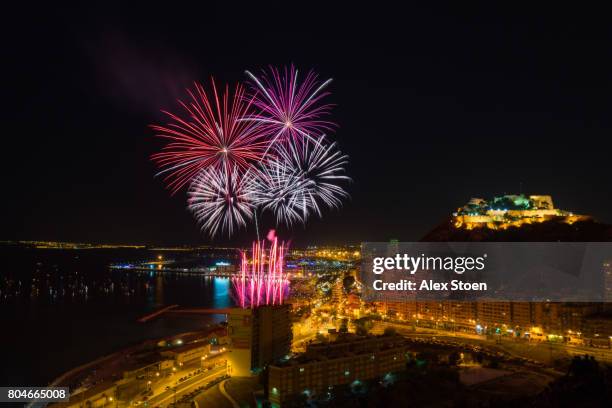 fireworks taken on the nights following the bonfires of saint john in southern spain - alicante fotografías e imágenes de stock