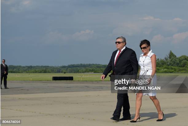 First lady Melania Trump's parents, Viktor Knavs and Amalija Knavs step off off Air Force One upon arrival in Morristown, New Jersey on June 30,...