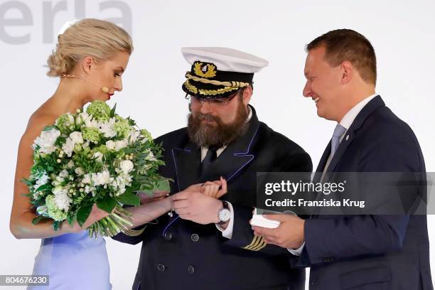 Godmother Lena Gercke, captain Boris Becker and AIDA President Felix Eichhorn during the Christening of AIDAperla Cruise Ship on June 30, 2017 in...