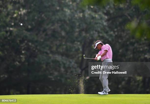 Kohki Idoki of Japan hits his second shot on the first hole during the second round of the 2017 U.S. Senior Open Championship at Salem Country Club...