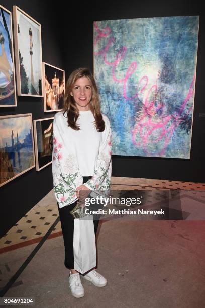 Artist Wendy Fulenwider Liszt poses in front of her artworj at Bacardi X The Dean Collection Present: No Commission on June 30, 2017 in Berlin,...